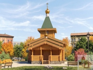 Шатрова дзвіниця дерев’яної церкви з позолоченим куполом